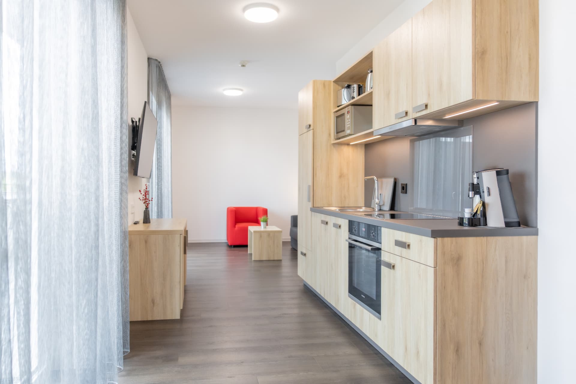 Voll ausgestattete Einbauküche im Boardinghouse Karlsdorf-Neuthard