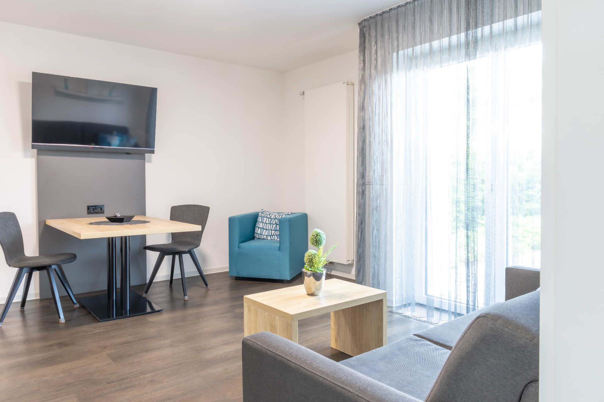 Wohnzimmer Apartment Nr. 5, Boardinghouse Karlsdorf-Neuthard